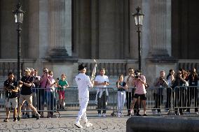 Olympic Torch Relay at the Louvre Pyramid- Paris