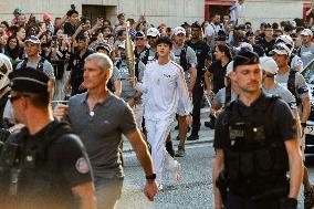 Kim Seok-jin with The Olympic torch - Paris