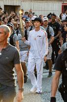 Kim Seok-jin with The Olympic torch - Paris