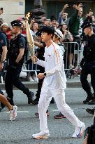 Kim Seok-jin with The Olympic torch - Paris