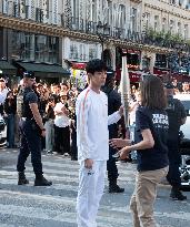 Kim Seok-jin with The Olympic torch - Paris