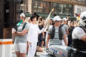 Kim Seok-jin with The Olympic torch - Paris