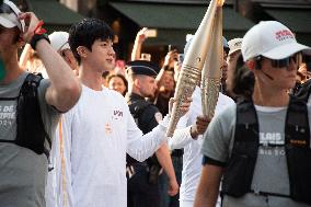 Kim Seok-jin with The Olympic torch - Paris