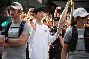 Kim Seok-jin with The Olympic torch - Paris