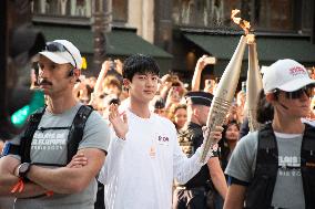 Kim Seok-jin with The Olympic torch - Paris