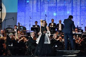 Concert For Olympic Flame Arrival At City Hall - Paris