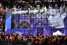 Concert For Olympic Flame Arrival At City Hall - Paris