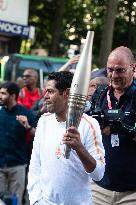 Paris 2024 - Jamel Debbouze Carries The Olympic Torch