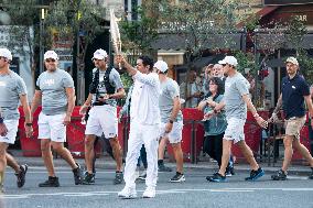 Paris 2024 - Jamel Debbouze Carries The Olympic Torch