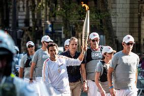 Paris 2024 - Jamel Debbouze Carries The Olympic Torch