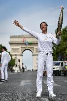 Paris 2024 - Olympic Flame At The Arc De Triomphe - Paris