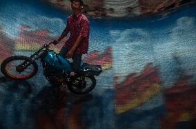 Motorcyclist Couple Braves A Giant Bowl - Sumatra