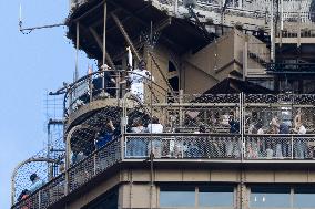 Olympic Torch Relay on the Eiffel Tower - Paris