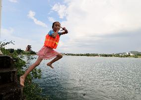 People Cool Off in Liuhzou