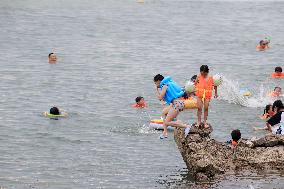 People Cool Off in Liuhzou