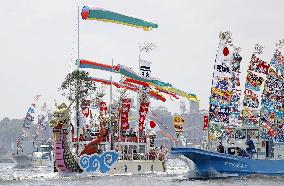 "Mikoshi" shrine cruises bay in northeastern Japan