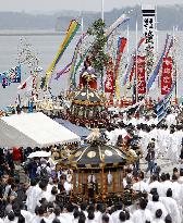 "Mikoshi" shrines cruise bay in northeastern Japan