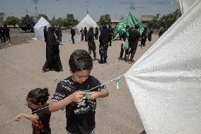 Iran's Shiite Muslims Commemorate The Mourning Day Of Ashoura