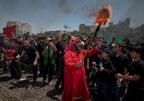 Iran's Shiite Muslims Commemorate The Mourning Day Of Ashoura