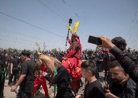 Iran's Shiite Muslims Commemorate The Mourning Day Of Ashoura