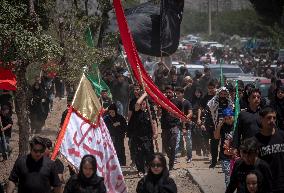 Iran's Shiite Muslims Commemorate The Mourning Day Of Ashoura