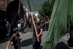 Iran's Shiite Muslims Commemorate The Mourning Day Of Ashoura