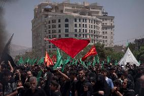 Iran's Shiite Muslims Commemorate The Mourning Day Of Ashoura