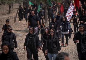 Iran's Shiite Muslims Commemorate The Mourning Day Of Ashoura