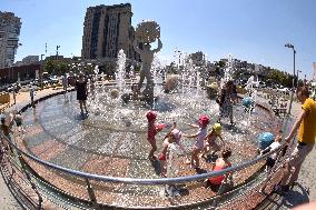 Bathing in Vinnytsia fountain on hot summer day