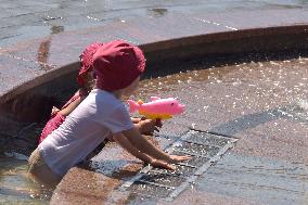 Bathing in Vinnytsia fountain on hot summer day