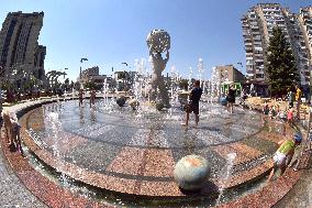 Bathing in Vinnytsia fountain on hot summer day