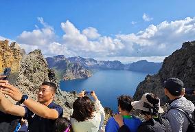 Tourists Visit The Tianchi Lake of Changbai Mountain in Yanbian