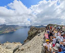 Tourists Visit The Tianchi Lake of Changbai Mountain in Yanbian