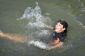 Paris 2024 - Mayor Anne Hidalgo Swims In The Seine River - Paris