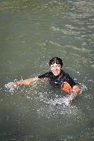 Paris 2024 - Mayor Anne Hidalgo Swims In The Seine River - Paris