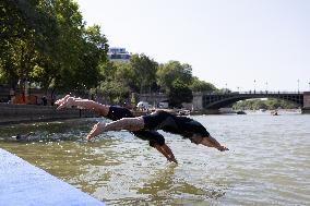 People Swimming In The Seine River - Paris