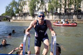 People Swimming In The Seine River - Paris