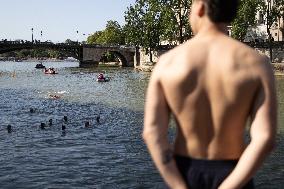 People Swimming In The Seine River - Paris