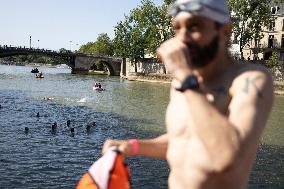 People Swimming In The Seine River - Paris