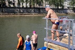 People Swimming In The Seine River - Paris