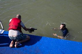 People Swimming In The Seine River - Paris