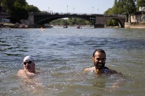 People Swimming In The Seine River - Paris