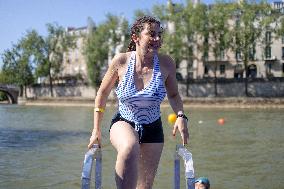 People Swimming In The Seine River - Paris