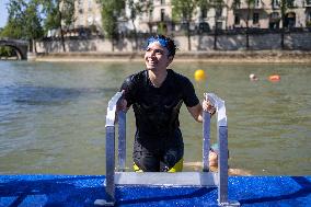 People Swimming In The Seine River - Paris