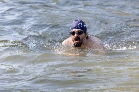 People Swimming In The Seine River - Paris