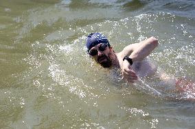 People Swimming In The Seine River - Paris