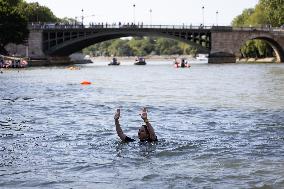 People Swimming In The Seine River - Paris