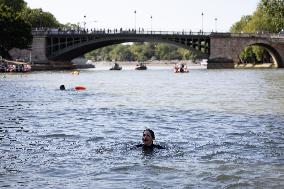 People Swimming In The Seine River - Paris