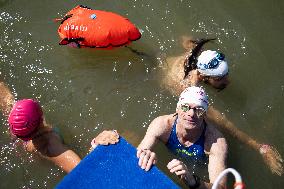 People Swimming In The Seine River - Paris