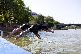 People Swimming In The Seine River - Paris